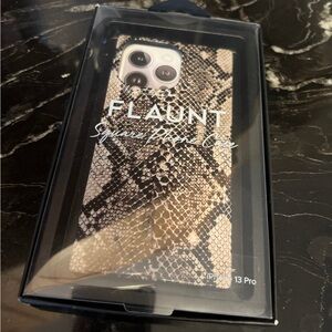 Brand new in box Flaunt Brand iPhone 13pro phone case in neutral snake print.